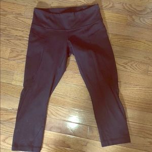 Black Lululemon Crop with mesh cutouts - size 6